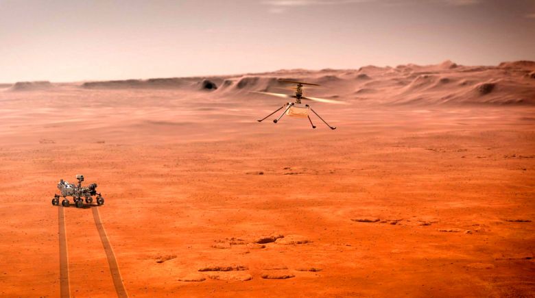 Concepo artstica mostra o drone Ingenuity voando sobre o solo marciano, prximo ao rover Perseverance. 